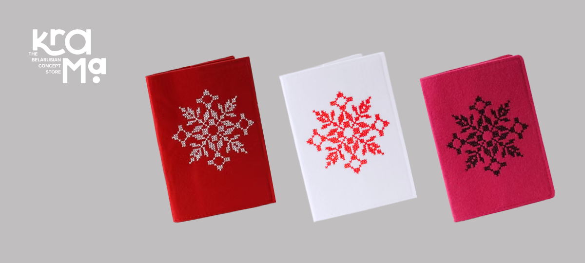 Чахлы з беларускім арнаментам у чырвоным, белым і ружовым колеры.